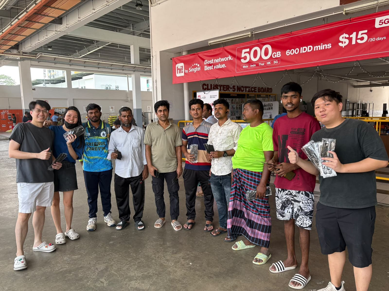 OnScam hands out masks to migrant workers at a Singapore dormitory cluster